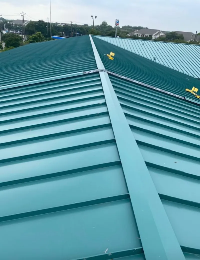 Green commercial metal roof ridge and valley for Metal Roof Repair in Upper Southampton
